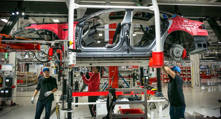 Tesla Reaches Settlement in Discrimination Case with Former Black Employee Tesla Reaches Settlement in Discrimination Case with Former Black Employee
