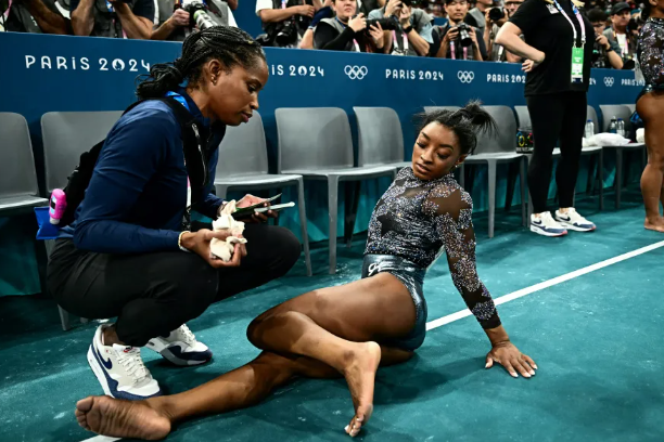 Simone Biles Overcomes Calf Pain to Shine in Qualifiers Simone Biles Overcomes Calf Pain to Shine in Qualifiers