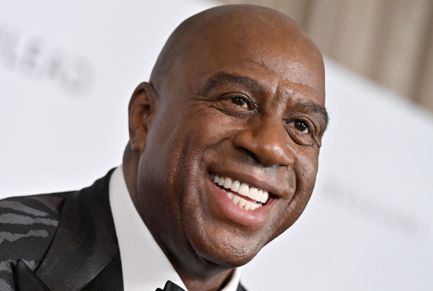 Magic Johnson Urges Black Men to Vote for Kamala Harris During Flint Rally Magic Johnson Urges Black Men to Vote for Kamala Harris During Flint Rally
