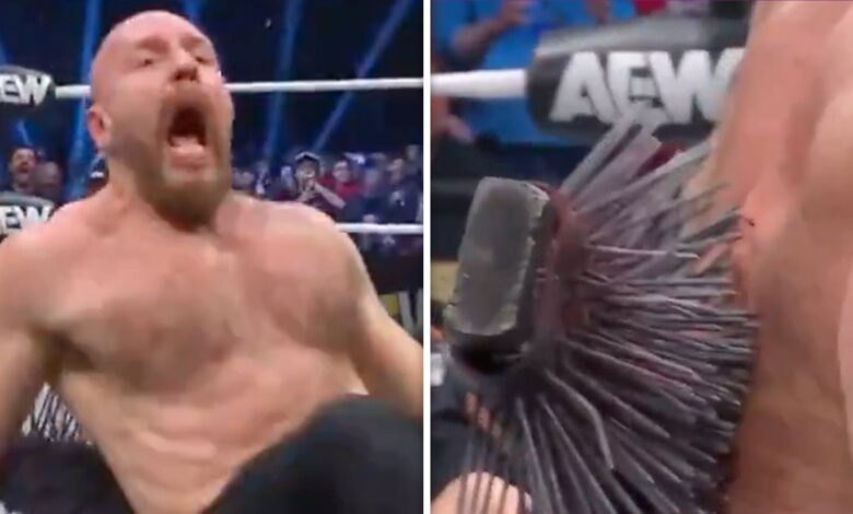 AEW’s Jon Moxley Gets Spiked Board Stuck In Back During Gruesome Match AEW’s Jon Moxley Gets Spiked Board Stuck In Back During Gruesome Match
