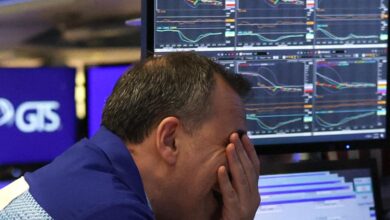 Stock market rout deepens as Dow plunges more than 2,200 points and Nasdaq enters bear market