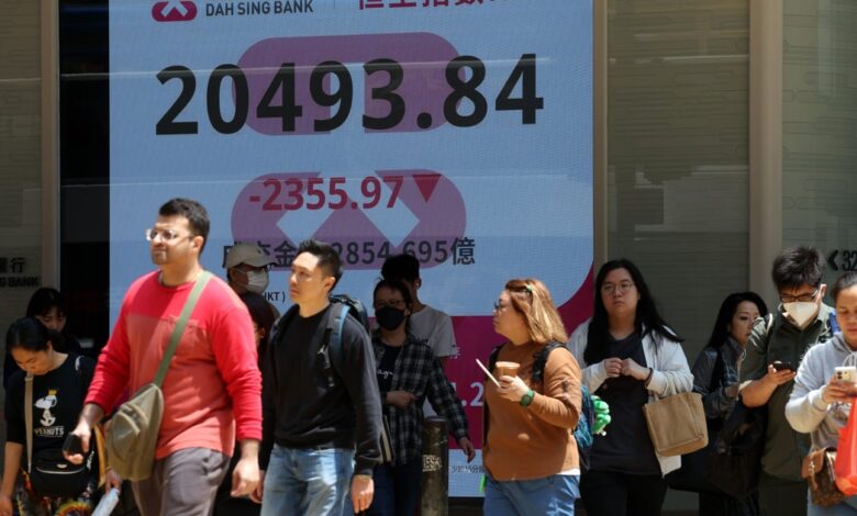 Asian stock markets plunge, U.S. futures tumble as tariff turmoil continues