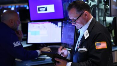 US stocks rally as Trump signals thaw in trade war, Tesla shares soar