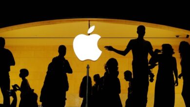 Apple girds for more trade war pain, trims buyback