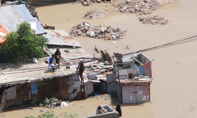 At least seven die as heavy rains leave waist-high floodwaters in Somalia’s capital At least seven die as heavy rains leave waist-high floodwaters in Somalia’s capital