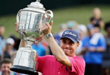 Don’t drop it! The PGA Championship’s 27-pound Wanamaker Trophy can be a beast to hoist