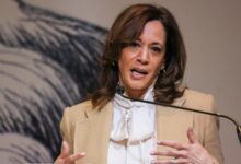 Kamala Harris steps back into limelight with speech criticizing Trump as he celebrates his first 100 days