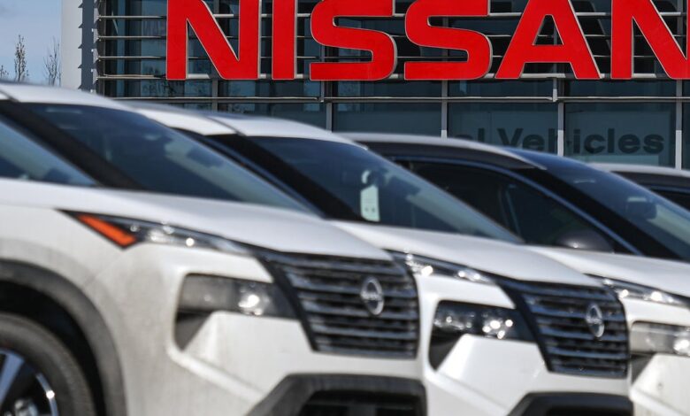 Nissan lays off 15% of its global work force amid slipping sales worldwide Nissan lays off 15% of its global work force amid slipping sales worldwide