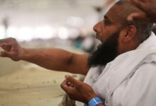 Symbolism and smiles during the stoning of the devil ritual at the Hajj