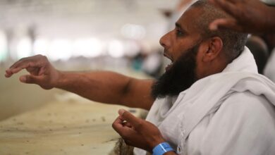 Symbolism and smiles during the stoning of the devil ritual at the Hajj