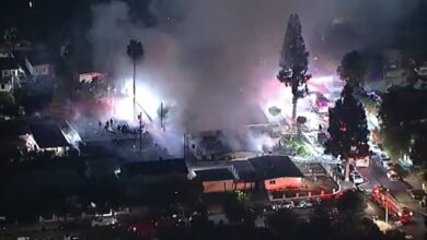 Over 100 firefighters battle California fireworks blaze that leaves woman in critical condition