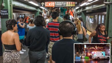 Straphanger, 51, on life support after stranger punches him to ground in Times Square subway station clash: cops, sources