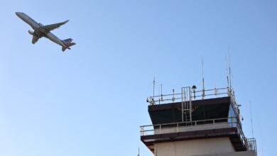 Air traffic controllers working without pay begin to call out sick, leading to flight cancellations and delays nationwide