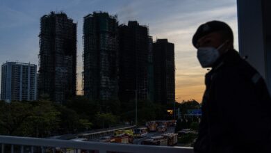Hong Kong firefighters make final search, apartment tower blaze kills 94
