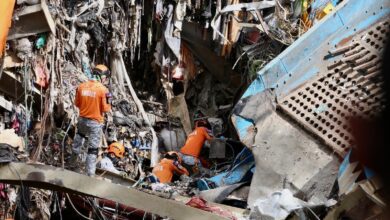 Filipino rescuers detect ‘signs of life’ in deadly garbage avalanche; dozens missing