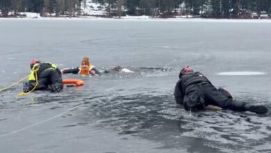 Washington man falls through ice into frigid lake — right in front of cops practicing water rescues