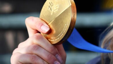 How much gold is in an Olympic gold medal, and how much is it worth?