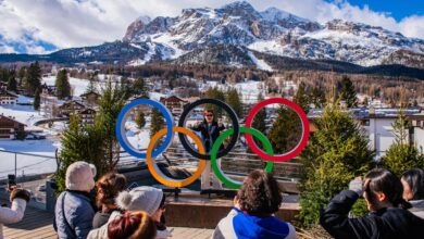 Olympians going for gold juggle day jobs to bring in some green