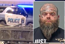 Heavily-tatted Ohio man jailed after stray gunfire from his property allegedly struck 2 shoppers at nearby Kroger
