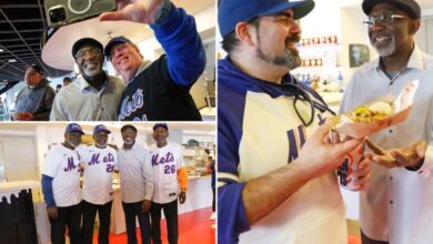 Mets World Series legend Mookie Wilson serves fans at Citi Field