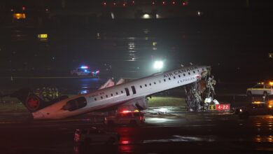 2 dead, LaGuardia Airport closed following collision between Air Canada plane and airport vehicle, officials say