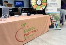 Applications for jobless benefits fall to 205,000 as layoffs remain historically low