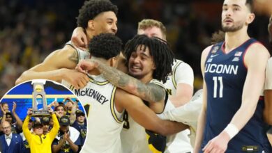 Michigan holds on to beat UConn for first national championship since 1989