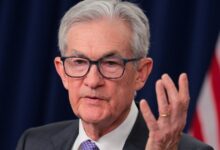Fed holds interest rates steady for third straight meeting, as Powell vows to remain as governor