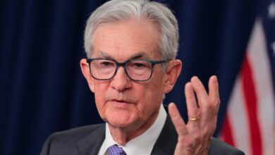 Fed holds interest rates steady for third straight meeting, as Powell vows to remain as governor