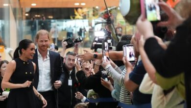 Prince Harry and Meghan arrive in Australia for a low-key, privately funded visit