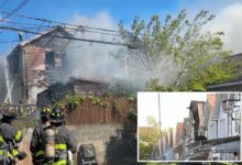 14 injured, including 12 firefighters, after fast-spreading fire tears through NYC homes