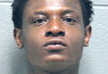 Chicago man charged with robbing delivery drivers while AWOL from gun case