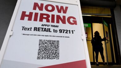 Retailers hire big, defying consumer warning signs