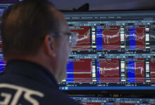 Stocks yield to bond market pressure