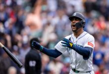 Woo strikes out 9 in 6 scoreless innings as Mariners beat Braves 3-1