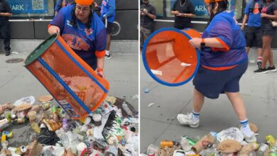 Total trash: wild video shows woman stealing Knicks garbage can and dumping refuse all over the street Total trash: wild video shows woman stealing Knicks garbage can and dumping refuse all over the street