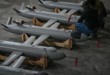 Ukrainian drone strikes kill 1 and spark fire at oil facility in Russia