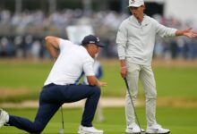 Well done, young man: 17-year-old Russell’s US Open debut impresses 54-year-old partner Harrington