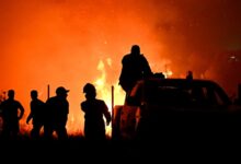 Hundreds of firefighters battle a wildfire in Portugal, while Greek authorities warn of toxic smoke